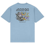 A light blue short-sleeve t-shirt shown from the back, featuring a large graphic print with the word 'HORROR' in a stylized font above an illustration of a ghostly figure, a yellow sun, and purple lightning.
