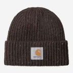 A dark brown ribbed knit beanie hat with a white square Carhartt logo patch on the front cuff, shown against a light gray background.