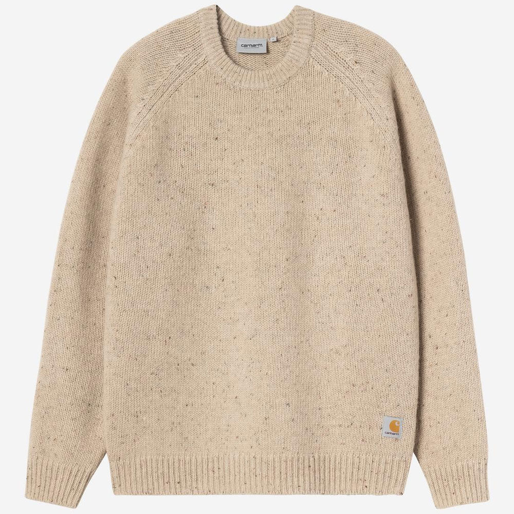 A beige Carhartt knit sweater with subtle multicolor flecks, featuring a crew neck, raglan sleeves, and a signature Carhartt logo patch on the lower left hem.