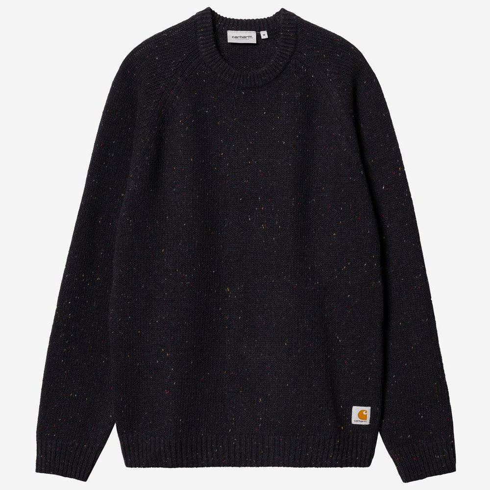 A dark navy blue knit sweater with subtle multicolor flecks, featuring a crew neck, raglan sleeves, and a small Carhartt logo patch on the lower left hem.