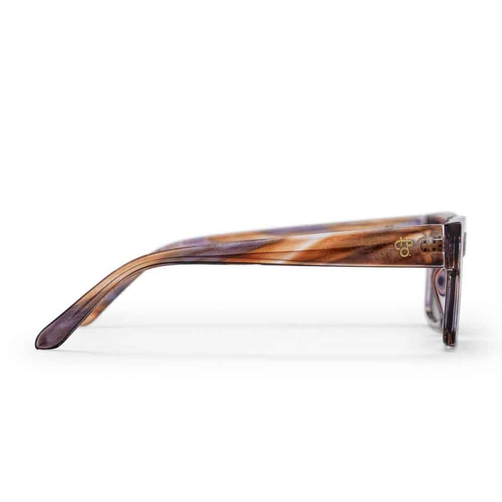 Square sunglasses with a translucent tortoiseshell frame in brown, beige, and purple tones, paired with dark brown lenses, shown against a plain white background.