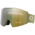 Oakley PRIZM ski goggles with an olive green strap and a large mirrored lens showing a gold-to-gray gradient. The Oakley 'O' logo is visible on the strap, and 'PRIZM' is printed on the lower right of the lens.