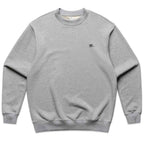 A light gray heather crewneck sweatshirt with a small black embroidered logo on the left chest, displayed flat against a white background.