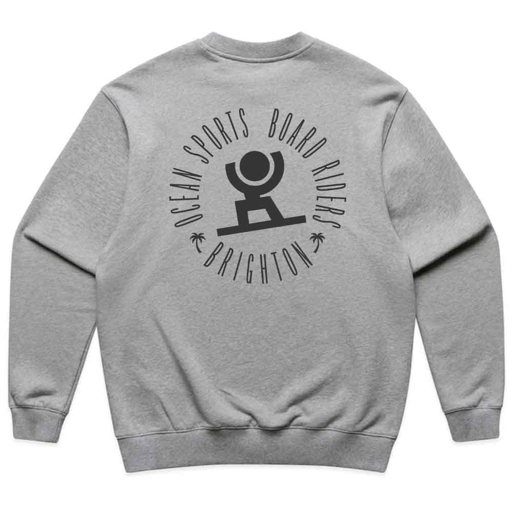 A heather gray crewneck sweatshirt shown from the back, featuring a black graphic print of a surfer inside a circular logo that reads 'OCEAN SPORTS BOARD RIDERS' and 'BRIGHTON'.