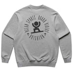 A heather gray crewneck sweatshirt shown from the back, featuring a black graphic print of a surfer inside a circular logo that reads 'OCEAN SPORTS BOARD RIDERS' and 'BRIGHTON'.