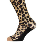 A single crew sock with a leopard print pattern in beige, brown, and black, featuring solid black heels, toes, and a beige cuff, shown on a white background.