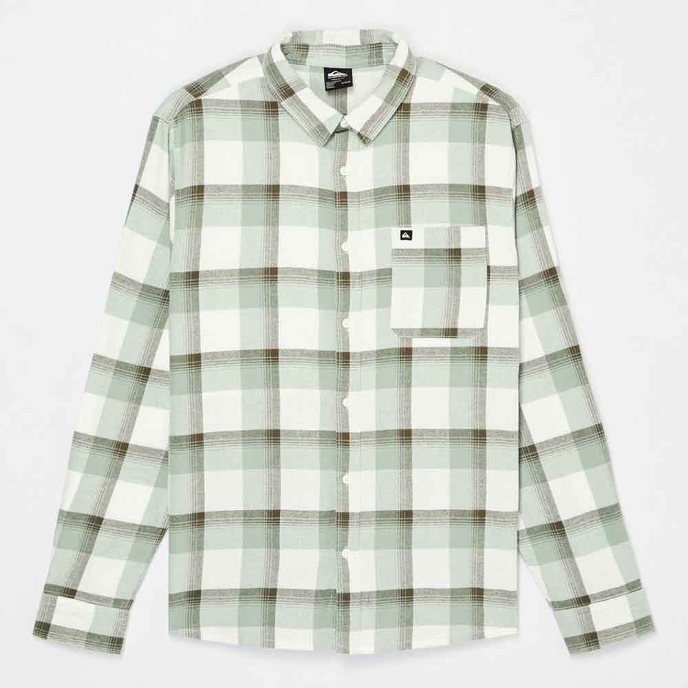 A long-sleeve button-up plaid shirt in sage green, white, and brown, featuring a chest pocket with a small black brand patch on the left chest.