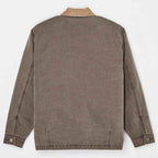 The back view of a brown corduroy jacket with a tan collar, laid flat against a white background.