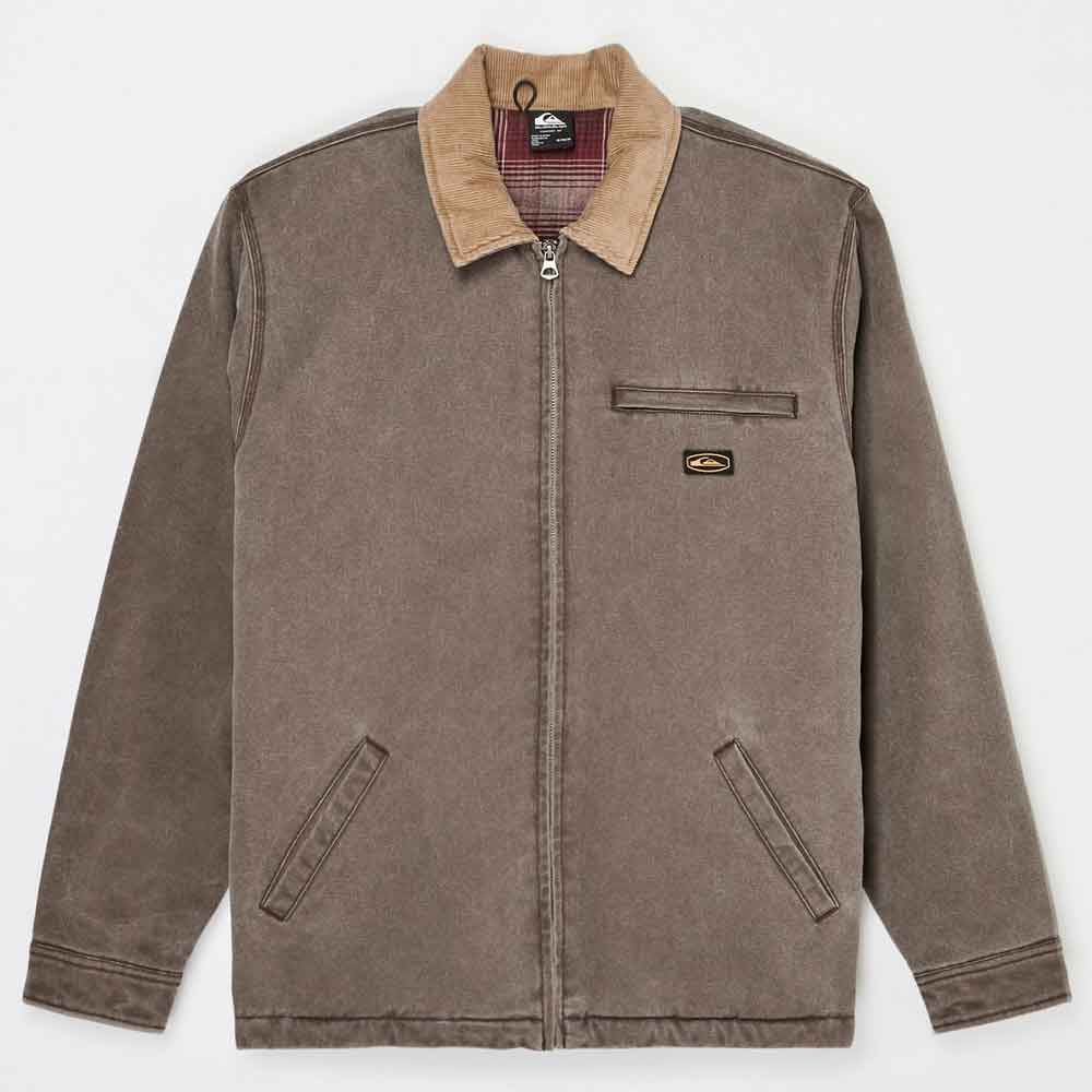 A brown zip-up work jacket with a tan corduroy collar, featuring a chest pocket with a small quiksilver logo patch, two front hand pockets, and a zippered front closure, shown flat on a light gray background.