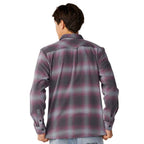 A man viewed from behind wearing a long-sleeve plaid button-up shirt in dark gray, black, and pink, paired with light blue jeans against a white background.