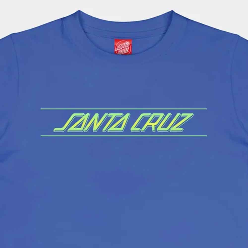 A blue crewneck t-shirt featuring the words 'SANTA CRUZ' in a stylized neon green font outlined in black, flanked by two horizontal green lines. A red Santa Cruz neck label is visible inside the collar.