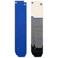 Two Stance crew socks displayed side-by-side on a white background. The left sock is solid royal blue, and the right sock features a cream upper section, a gray textured midsection, and a black toe with blue and teal details.