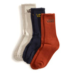 Three pairs of Vans socks in beige, navy, and orange on a white background