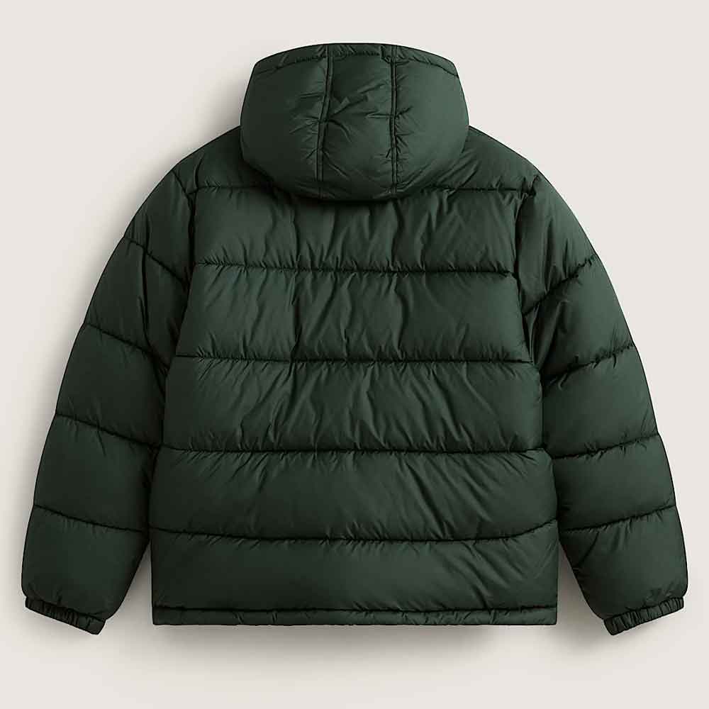 A dark forest green hooded puffer jacket shown from the back, featuring horizontal quilting and elastic cuffs, photographed against a light beige background.