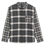 A long-sleeve button-up flannel shirt by Vans, featuring a dark gray and white plaid pattern with a single chest pocket.
