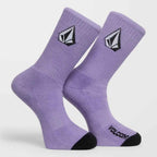 A pair of Volcom crew socks in lavender purple, featuring the brand's signature diamond logo on the upper calf and a black toe cap.