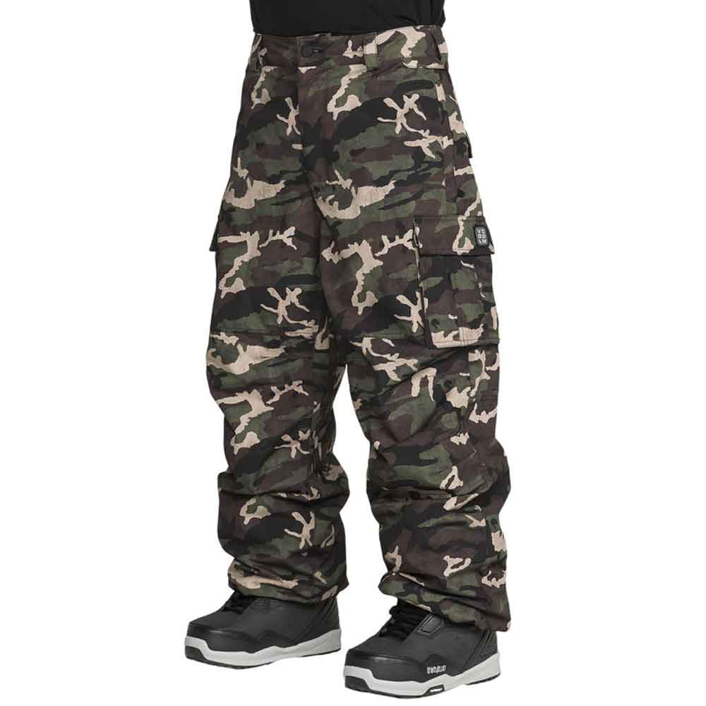 A person wearing camouflage cargo snow pants with black and gray snow boots, shown from the waist down on a plain white background.