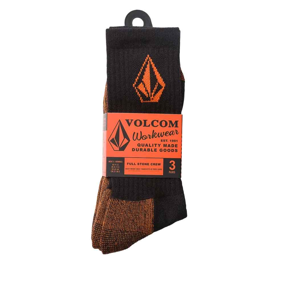 A 3-pack of Volcom Workwear men's socks in black and brown, packaged with a bright orange paper band featuring the Volcom logo.
